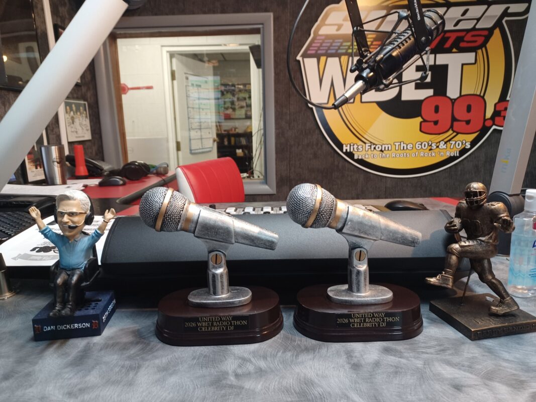 These pewter microphone trophies, shown on the studio console, are the